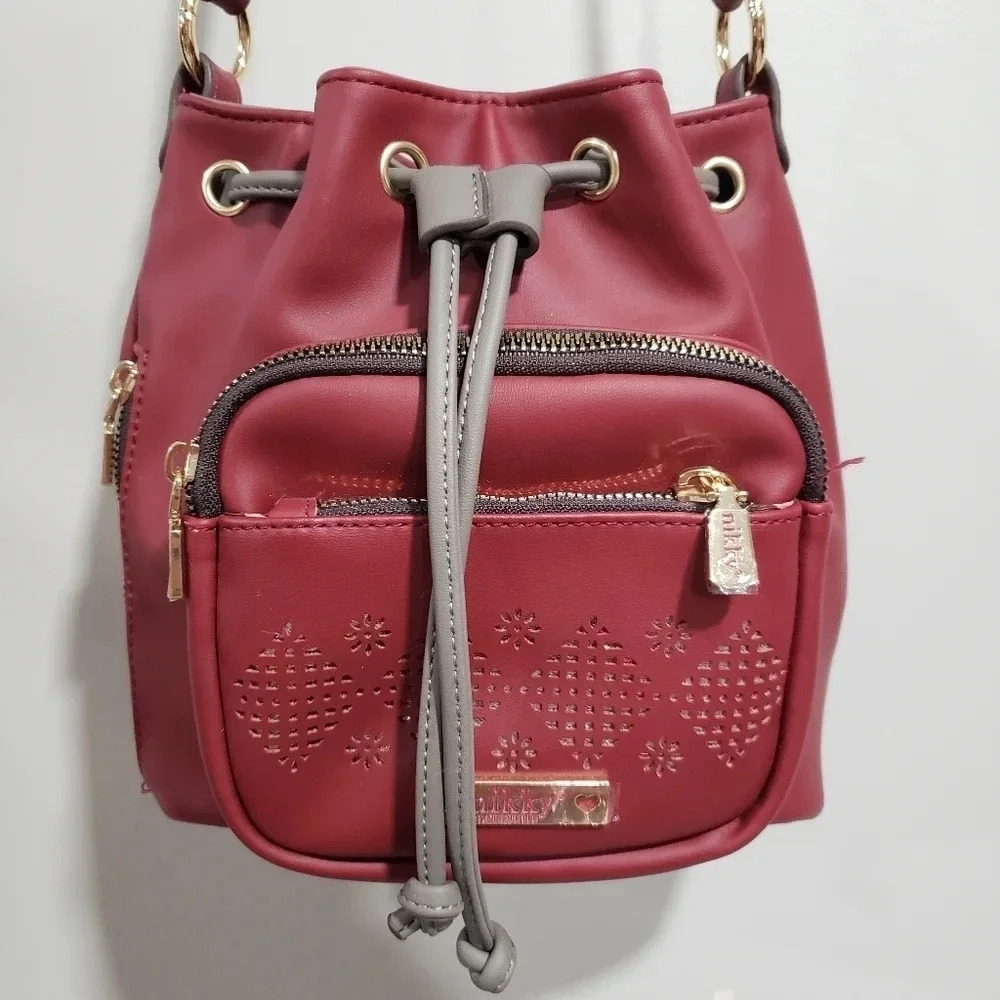 Nora Drawstring Red Bucket Bag  by Nikki/Nicole Lee.